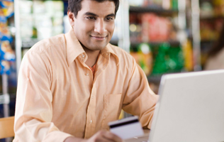 man using a laptop computer